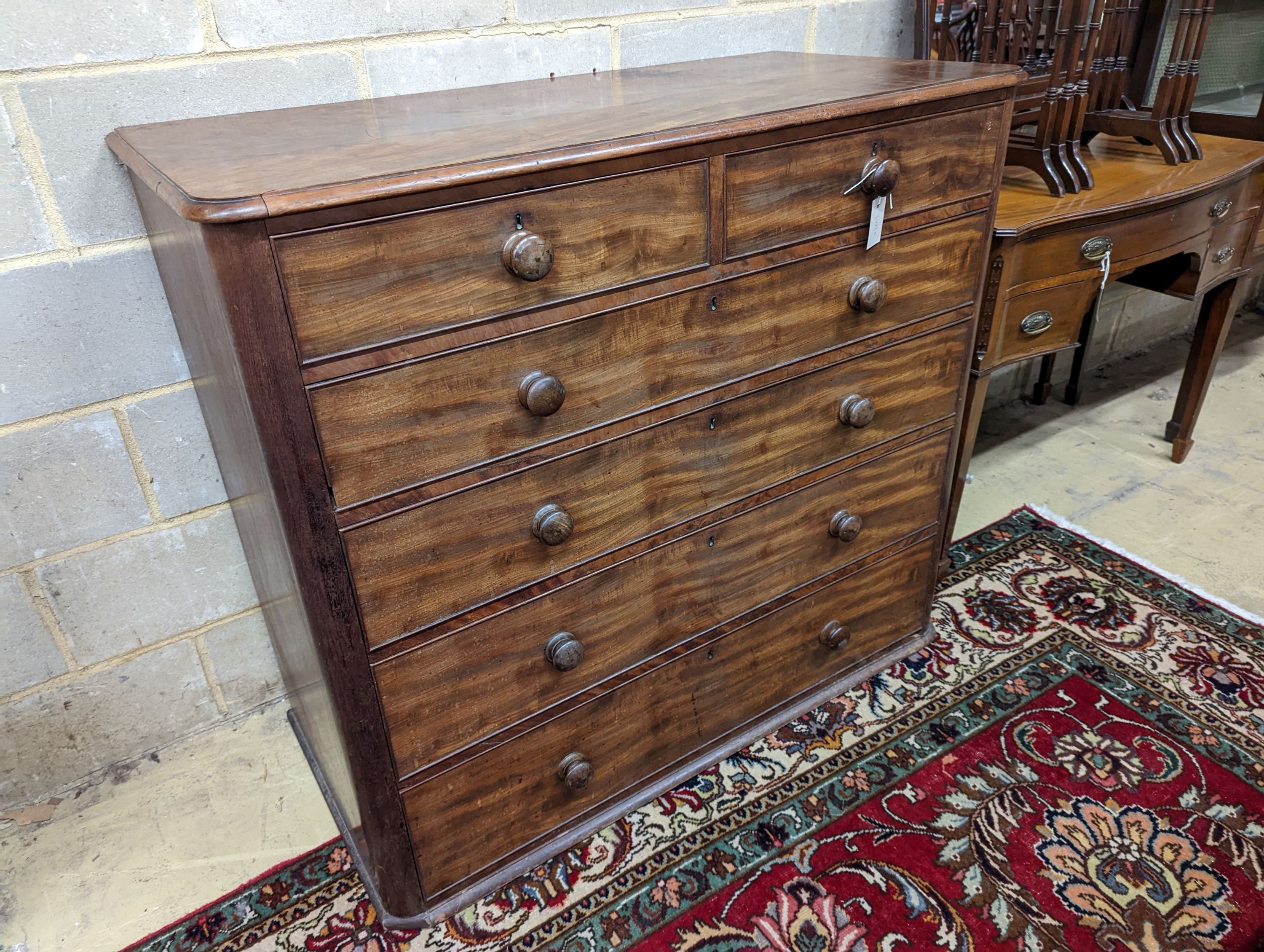 A Victorian mahogany chest of two short and four long drawers. (No feet) W-120cm, D-58cm, H-107cm.